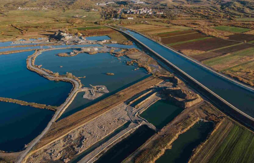 aerial-view-on-open-pit-mine-of-sand-hummus-